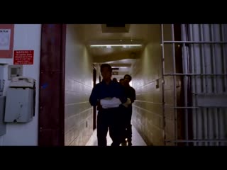 stan walks into his cell in the prison. moment from the movie big stan 2007