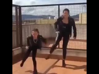 dancing mother and daughter